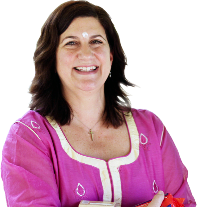 Tribe Rising India co-founder smiling, wearing a pink tunic