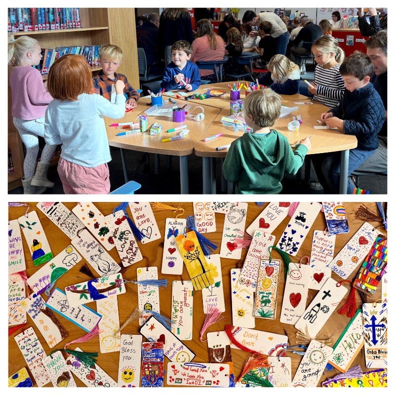 Students with handmade bookmarks